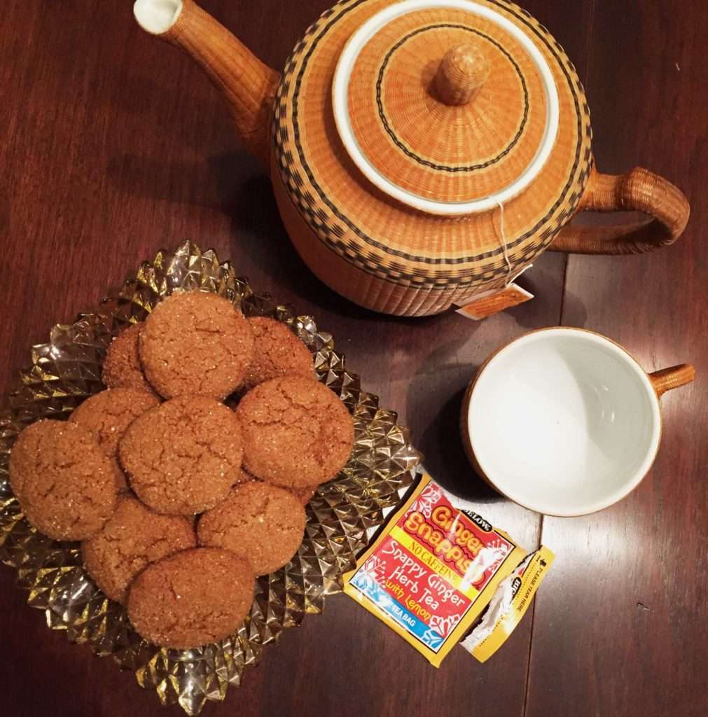 A bowl of cookies on top of a table.
